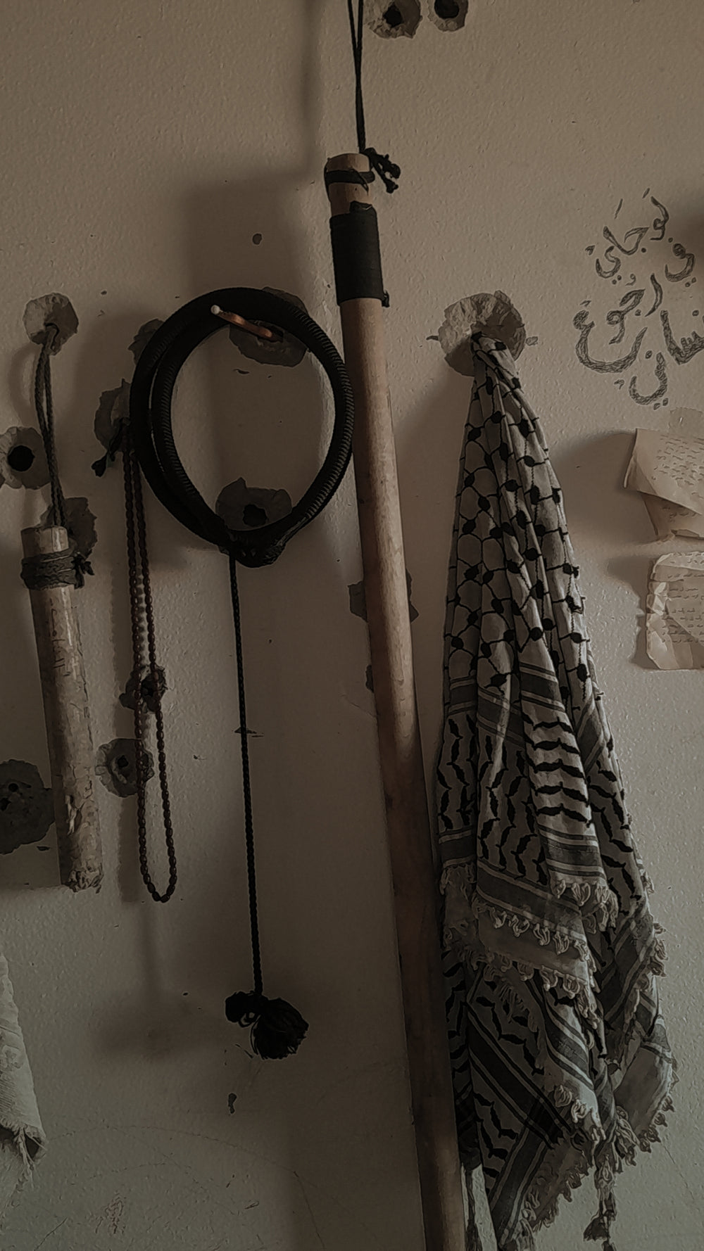 A Palestinian keffiyeh and personal objects